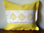 Pillow case decorated with daffodil freestanding lace crochet squares