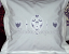A pillow case with hearts cutwork embroidery