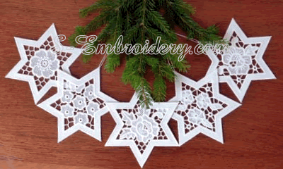 10631 Free standing lace and cutwork star ornaments