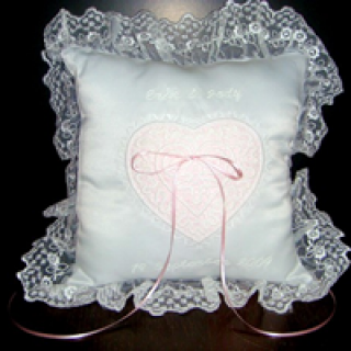 Ring bearer pillow with lace heart