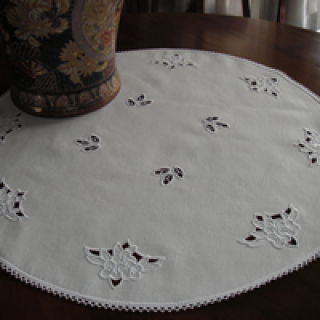 Table top with cutwork lace embroidery